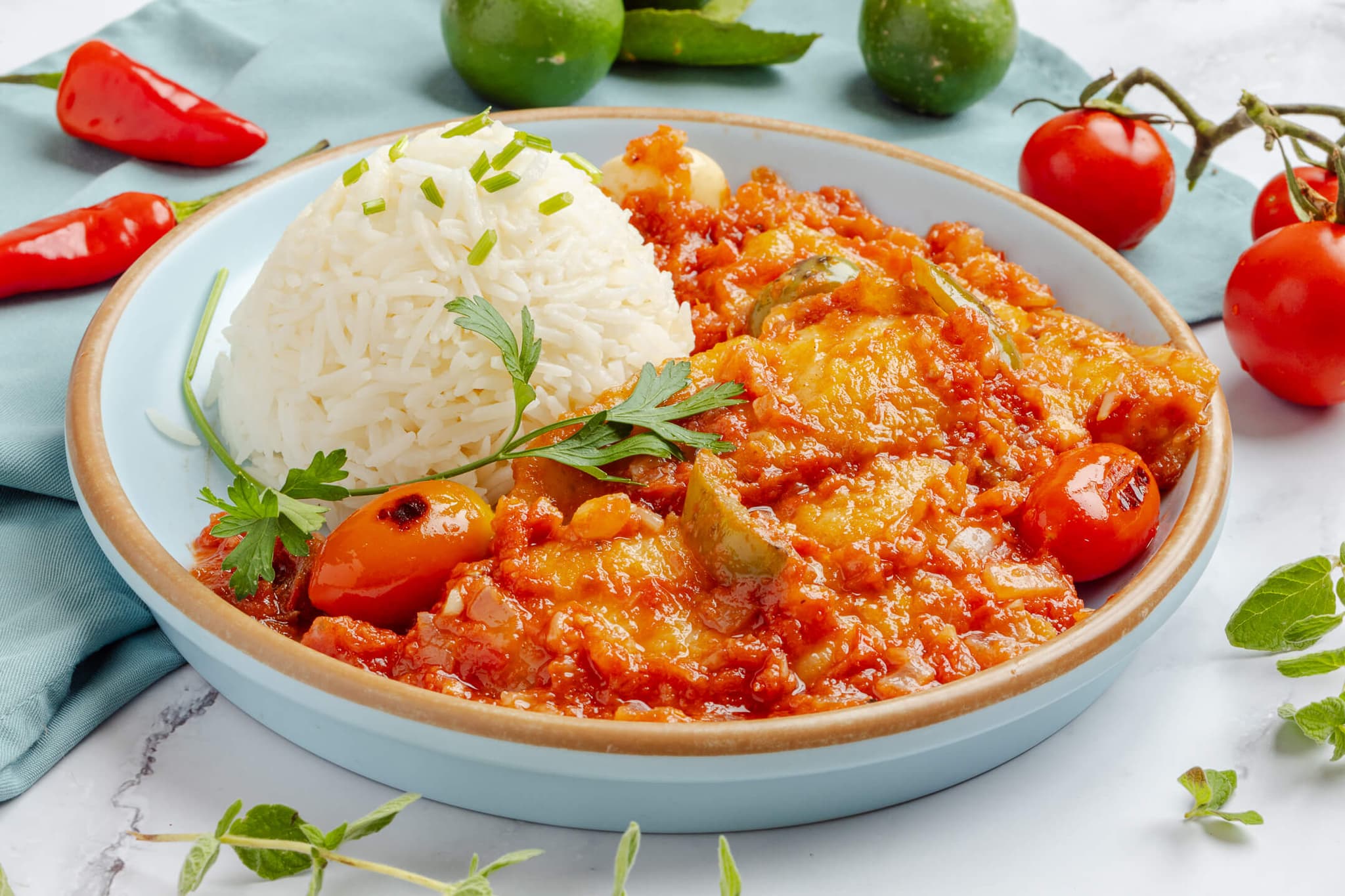 Fish fillet in red sauce with rice — homemade Lebanese food by Mahabati